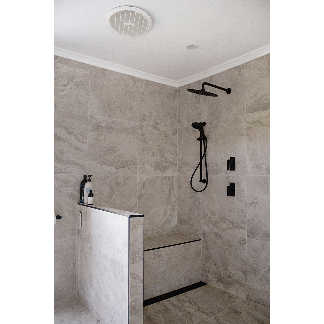 Stone Tile Bathroom & Arched Vanity